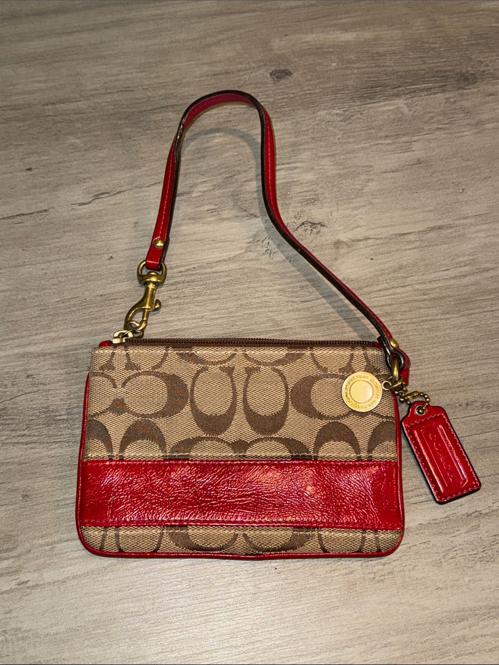 Coach Brown Signature Canvas Wristlet with Red Leather Trim